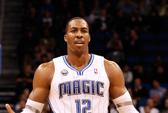 ORLANDO, FL - FEBRUARY 08:  Dwight Howard #12 of the Orlando Magic reacts to a foul during the game against the Los Angeles Clippers at Amway Arena on February 8, 2011 in Orlando, Florida.  NOTE TO USER: User expressly acknowledges and agrees that, by downloading and or using this Photograph, user is consenting to the terms and conditions of the Getty Images License Agreement.  (Photo by Sam Greenwood/Getty Images)