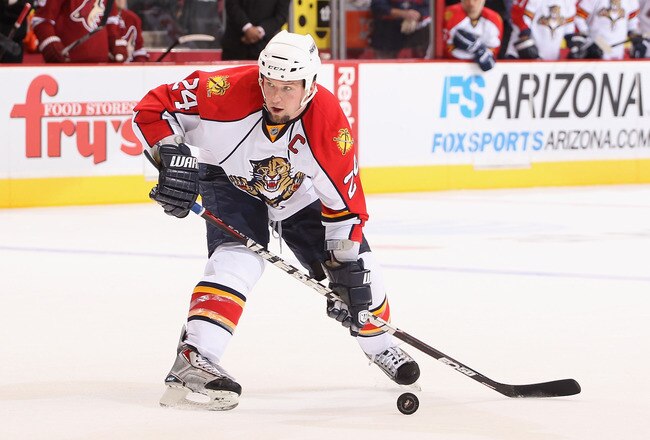 GLENDALE, AZ - DECEMBER 04:  Bryan McCabe #24 of the Florida Panthers skates with the puck  during the NHL game against the Phoenix Coyotes at Jobing.com Arena on December 4, 2010 in Glendale, Arizona.  The Panthers defeated the Coyotes 2-1 in an overtime shoot out.  (Photo by Christian Petersen/Getty Images)