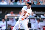 BALTIMORE - SEPTEMBER 19:  Luke Scott #30 of the Baltimore Orioles hits a double in the eleventh inning against the New York Yankees at Camden Yards on September 19, 2010 in Baltimore, Maryland. The Orioles won the game 4-3.  (Photo by Greg Fiume/Getty Images)