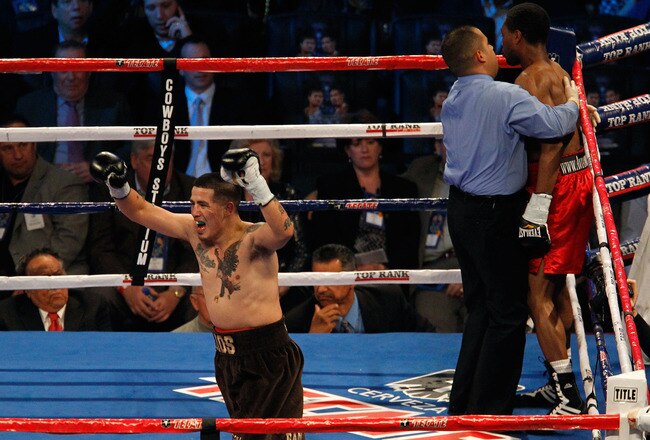 ARLINGTON, TX - NOVEMBER 13:  Brandon Rios (brown trunks) celebrates after he won his match against Omri Lowther during their Super Lightweight bout at Cowboys Stadium on November 13, 2010 in Arlington, Texas.  (Photo by Tom Pennington/Getty Images)