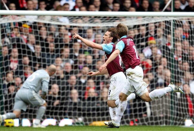 LONDON, ENGLAND - FEBRUARY 27:  Scott Parker (2L) of West Ham celebrates with teammate Thomas Hitzlsperger as he scores the opening goal during the Barclays Premier League match between West Ham United and Liverpool at the Boleyn Ground on February 27, 2011 in London, England.  (Photo by Scott Heavey/Getty Images)