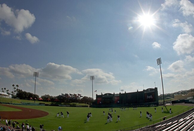 LAKE BUENA VISTA, FL - FEBRUARY 21:  The Atlanta Braves stretch during a spring training workout at Champion Stadium on February 21, 2011 in Lake Buena Vista, Florida.  (Photo by Mike Ehrmann/Getty Images)