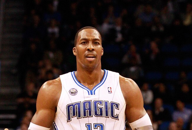 ORLANDO, FL - FEBRUARY 08:  Dwight Howard #12 of the Orlando Magic reacts to a foul during the game against the Los Angeles Clippers at Amway Arena on February 8, 2011 in Orlando, Florida.  NOTE TO USER: User expressly acknowledges and agrees that, by downloading and or using this Photograph, user is consenting to the terms and conditions of the Getty Images License Agreement.  (Photo by Sam Greenwood/Getty Images)