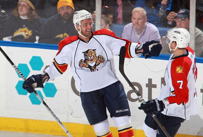 BUFFALO, NY - DECEMBER 23: Chris Higgins #21 and Dmitry Kulikov #7 of the Florida Panthers celebrate Higgins goal in the first period against the Buffalo Sabres at HSBC Arena on December 23, 2010 in Buffalo, New York.  (Photo by Rick Stewart/Getty Images)