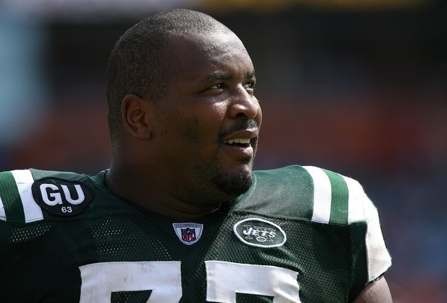 MIAMI - SEPTEMBER 07:  Kris Jenkins #77 of the New York Jets looks on against the Miami Dolphins at Dolphin Stadium on September 7, 2008 in Miami, Florida. The Jets won 20-14. (Photo by Doug Benc/Getty Images)