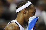 AUBURN HILLS, MI - APRIL 26: Richard Hamilton #32 of the Detroit Pistons wipes his face during a time out while playing the Cleveland Cavaliers in Game Four of the Eastern Conference Quarterfinals during the 2009 NBA Playoffs at the Palace of Auburn Hills on April 26, 2009 in Auburn Hills, Michigan. Cleveland won the game 99-78 to win the series 4-0. NOTE TO USER: User expressly acknowledges and agrees that, by downloading and or using this photograph, User is consenting to the terms and conditions of the Getty Images License Agreement.  (Photo by Gregory Shamus/Getty Images)