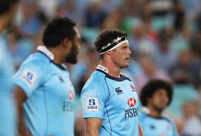 SYDNEY, AUSTRALIA - FEBRUARY 26: Al Baxter of the Waratahs watches on during the round two Super Rugby match between the Waratahs and the Reds at ANZ Stadium on February 26, 2011 in Sydney, Australia.  (Photo by Mark Kolbe/Getty Images)
