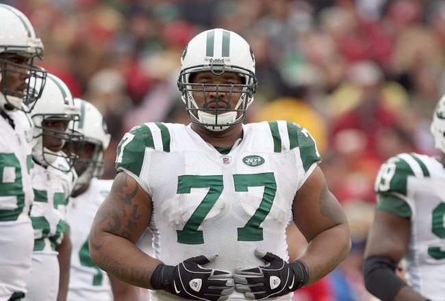 SAN FRANCISCO - DECEMBER 07:  Kris Jenkins #77 of the New York Jets stands on the field against the San Francisco 49ers during an NFL game on December 7, 2008 at Candlestick Park in San Francisco, California. (Photo by Jed Jacobsohn/Getty Images)