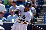 TAMPA, FL - FEBRUARY 26:  Infielder Robinson Cano #24 of the New York Yankees fouls off a pitch against the Philadelphia Phillies during a Grapefruit League Spring Training Game at George M. Steinbrenner Field on February 26, 2011 in Tampa, Florida.  (Photo by J. Meric/Getty Images)