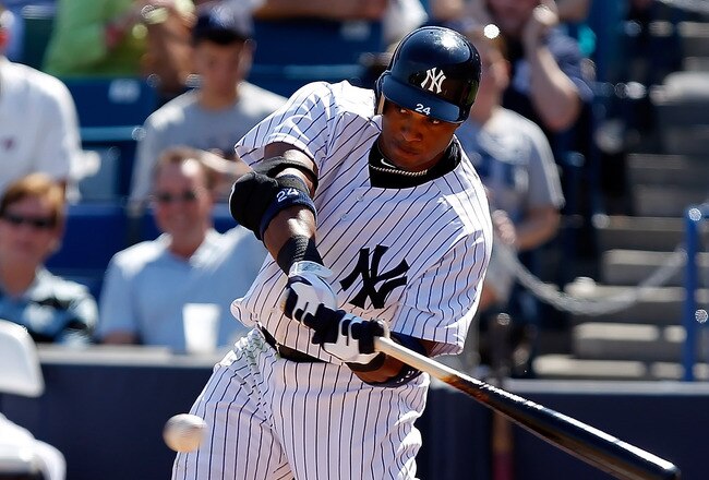 TAMPA, FL - FEBRUARY 26:  Infielder Robinson Cano #24 of the New York Yankees fouls off a pitch against the Philadelphia Phillies during a Grapefruit League Spring Training Game at George M. Steinbrenner Field on February 26, 2011 in Tampa, Florida.  (Photo by J. Meric/Getty Images)