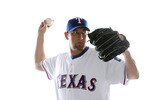 SURPRISE, AZ - FEBRUARY 25:  Brandon Webb #33 of the Texas Rangers poses for a portrait during Spring Training Media Day on February 25, 2011 at Surprise Stadium in Surprise, Arizona.  (Photo by Jonathan Ferrey/Getty Images)