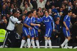 LONDON, ENGLAND - MARCH 01: David Luiz of Chelsea is congratulated by team mates after scoring his goal during the Barclays Premier League match between Chelsea and Manchester United at Stamford Bridge on March 1, 2011 in London, England.  (Photo by Clive Mason/Getty Images)