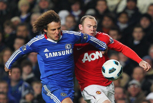 LONDON, ENGLAND - MARCH 01:  David Luiz of Chelsea challenges Wayne Rooney of Manchester United during the Barclays Premier League match between Chelsea and Manchester United at Stamford Bridge on March 1, 2011 in London, England.  (Photo by Clive Rose/Getty Images)