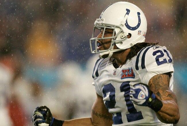 MIAMI GARDENS, FL - FEBRUARY 04:  Safety Bob Sanders #21 of the Indianapolis Colts celebrates after his tackle of Cedric Benson #32 of the Chicago Bears for the Colts to recover the fumble in the first quarter of Super Bowl XLI on February 4, 2007 at Dolphin Stadium in Miami Gardens, Florida.  (Photo by Donald Miralle/Getty Images)