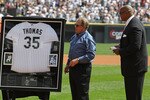 CHICAGO - AUGUST 29: Chairman Jerry Reinsdorf of the Chicago White Sox makes a presentation to former player Frank Thomas during a ceremony retiring Thomas' number 35 before a game against the New York Yankees at U.S. Cellular Field on August 29, 2010 in Chicago, Illinois. (Photo by Jonathan Daniel/Getty Images)
