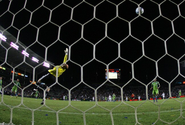 CARSON, CA - NOVEMBER 07:  Kasey Keller #18 of Seattle Sounders FC dives back for the ball on a shot that went wide over the net by the Los Angeles Galaxy in the second half during the MLS Western Conference Semifinal match second leg at The Home Depot Center on November 7, 2010 in Carson, California. The Galaxy defeated Sounders FC 2-1. (Photo by Victor Decolongon/Getty Images)
