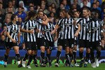 LIVERPOOL, ENGLAND - SEPTEMBER 18:  Hatem Ben Arfa of Newcastle United celebrates with team mates after scoring the opening goal during the Barclays Premier League match between Everton and Newcastle United at Goodison Park on September 18, 2010 in Liverpool, England.  (Photo by Alex Livesey/Getty Images)