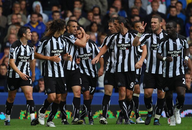 LIVERPOOL, ENGLAND - SEPTEMBER 18:  Hatem Ben Arfa of Newcastle United celebrates with team mates after scoring the opening goal during the Barclays Premier League match between Everton and Newcastle United at Goodison Park on September 18, 2010 in Liverpool, England.  (Photo by Alex Livesey/Getty Images)