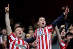 LONDON, ENGLAND - MARCH 05:  Sunderland fans show their support during the Barclays Premier League match between Arsenal and Sunderland at Emirates Stadium on March 5, 2011 in London, England.  (Photo by Mike Hewitt/Getty Images)