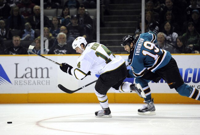 SAN JOSE, CA - MARCH 5: Jamie Benn #14 of the Dallas Stars race for the puck with Joe Thornton #19 of the San Jose Sharks in the second period during an NHL hockey game at the HP Pavilion on March 5, 2011 in San Jose, California. The Stars won the game 3-2. (Photo by Thearon W. Henderson/Getty Images)