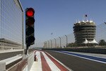 MANAMA, BAHRAIN - FEBRUARY 20:  A traffic light is turned red at the empty Formula One race track at Bahrain International Circuit on February 20, 2011 in Manama, Bahrain. The season-opening race is in doubt due to the continued unrest in the country. Formula One boss Bernie Ecclestone has said he will leave the decision on whether to hold the Bahrain Grand Prix to the country's Crown Prince Salman ibn Hamad ibn Isa Al Khalifa. The final decision is expected by February 22.  (Photo by John Moore/Getty Images)