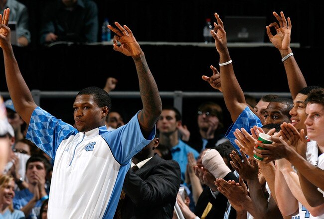 CHAPEL HILL, NC - NOVEMBER 30:  Deon Thompson (R) #21 of the North Carolina Tar Heels and the rest of the bench react and cheer after the Blue Team hits a three-point basket against the UNC Asheville Bulldogs during the game at the Dean E. Smith Center on November 30, 2008 in Chapel Hill, North Carolina.  (Photo by Kevin C. Cox/Getty Images)