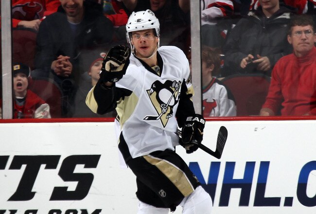 NEWARK, NJ - MARCH 04:  Tyler Kennedy #48 of the Pittsburgh Penguins scores at 5:58 of the second period against the New Jersey Devils at the Prudential Center on March 4, 2011 in Newark, New Jersey.  (Photo by Bruce Bennett/Getty Images)