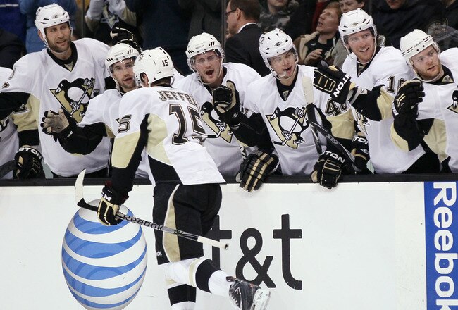 BOSTON, MA - MARCH 05:  Dustin Jeffrey #15 of the Pittsburgh Penguins is congratulated by teammates on the bench after he scored in the second period against the Boston Bruins on March 5, 2011 at the TD Garden in Boston, Massachusetts.  (Photo by Elsa/Getty Images)