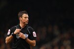 LONDON, ENGLAND - MARCH 05:  Referee Mark Clattenburg in action during the Barclays Premier League match between Fulham and Blackburn Rovers at Craven Cottage on March 5, 2011 in London, England.  (Photo by Richard Heathcote/Getty Images)