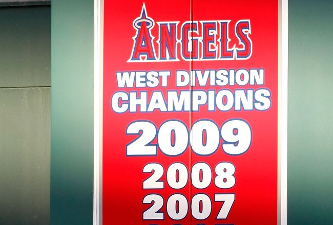 ANAHEIM, CA - OCTOBER 01:  A banner in center field announces the 2009 West Division Champion Los Angeles Angels of Anaheim during the game against the Texas Rangers at Angel Stadium on October 1, 2009 in Anaheim, California. The Rangers defeated the Angels 11-3.  (Photo by Jeff Gross/Getty Images)
