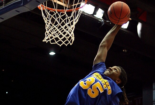 DAYTON, OH - MARCH 20: Kenneth Faried #35 of the Morehead State Eagles drives to the hoop against the Louisville Cardinals during the first round of the NCAA Division I Men's Basketball Tournament at the University of Dayton Arena on March 20, 2009 in Dayton, Ohio.  (Photo by Andy Lyons/Getty Images)