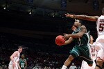NEW YORK - NOVEMBER 28: Aaron Johnson #1 of the UAB Blazers lays the ball up under the arm of Josh Southern #52 of the Boston College Eagles during Pre-Season NIT on November 28, 2008 at Madison Square Garden in New York City.  (Photo by Nick Laham/Getty Images)