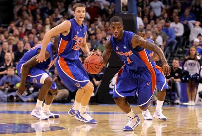 OKLAHOMA CITY - MARCH 18:  Kenny Boynton #1 of  the Florida Gators pushes the ball up court in overtime against the BYU Cougars during the first round of the 2010 NCAA men�s basketball tournament at Ford Center on March 18, 2010 in Oklahoma City, Oklahoma.  (Photo by Ronald Martinez/Getty Images)