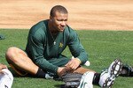 PHOENIX, AZ - FEBRUARY 16:  Michael Choice #71 of the Oakland Athletics warms up during a MLB spring training practice at Phoenix Municipal Stadium on February 16, 2011 in Phoenix, Arizona.  (Photo by Christian Petersen/Getty Images)
