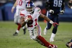 NASHVILLE, TN - NOVEMBER 26:  Tiki Barber #21 of the New York Giants runs the ball against the Tennessee Titans during their game on November 26, 2006 at LP Field in Nashville, Tennessee.  (Photo by Jim McIsaac/Getty Images)