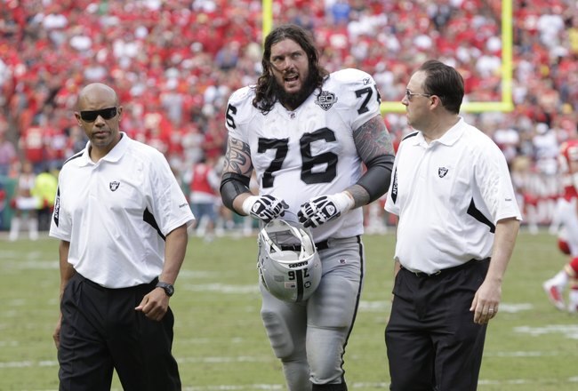 KANSAS CITY, MO - SEPTEMBER 20:  Robert Gallery #76 of the Oakland Raiders walks off the field during the game against the Kansas City Chiefs at Arrowhead Stadium on September 20, 2009 in Kansas City, Missouri. (Photo by Jamie Squire/Getty Images)