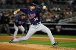 NEW YORK - OCTOBER 09:  Scott Baker #30 of the Minnesota Twins throws a pitch against the New York Yankees during Game Three of the ALDS part of the 2010 MLB Playoffs at Yankee Stadium on October 9, 2010 in the Bronx borough of New York City.  (Photo by Andrew Burton/Getty Images)