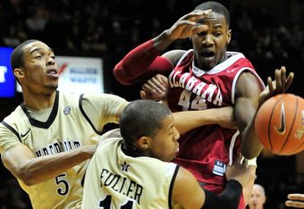 NASHVILLE, TN - FEBRUARY 10: Lance Goulboune #5 and Kyle Fuller #11 of the Vanderbilt Commodores battle Chris Hines #44 of the Alabama Crimson Tide for the ball at Memorial Gym on February 10, 2011 in Nashville, Tennessee. (Photo by Grant Halverson/Getty Images)