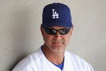 GLENDALE, AZ - MARCH 05:  Manager Don Mattingly of the Los Angeles Dodgers watches from the dugout during the spring training game against the Cincinnati Reds at Camelback Ranch on March 5, 2011 in Glendale, Arizona.  (Photo by Christian Petersen/Getty Images)