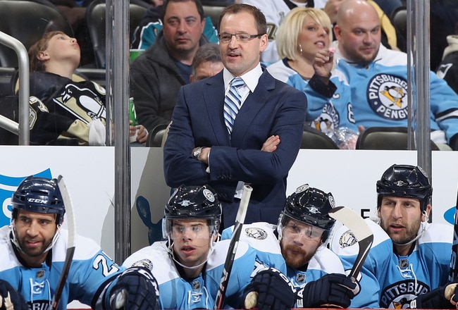 PITTSBURGH, PA - FEBRUARY 23:  Head coach Dan Bylsma of the Pittsburgh Penguins watches from the bench during the NHL game against the San Jose Sharks at Consol Energy Center on February 23, 2011 in Pittsburgh, Pennsylvania.  The Sharks defeated the Penguins 3-2 in overtime.  (Photo by Christian Petersen/Getty Images)