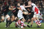 BELFAST, NORTHERN IRELAND - MARCH 04:  Alberto De Marchi of Aironi Rugby is tackled by Paddy Wallace and Tom Court of Ulster during the Magners League match between Ulster and Aironi at Ravenhill on March 04, 2011 in Belfast, Northern Ireland. (Photo by Patrick Bolger/Getty Images for Aironi)