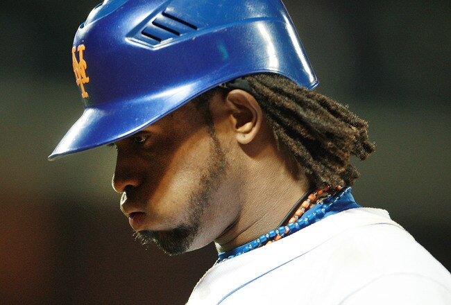 NEW YORK - AUGUST 25:  Jose Reyes #7 of the New York Mets reacts after hitting a ground out in the ninth inning against the Florida Marlins on August 25, 2010 at Citi Field in the Flushing neighborhood of the Queens borough of New York City. The Marlins defeated the Mets 5 - 4.  (Photo by Andrew Burton/Getty Images)