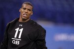 INDIANAPOLIS, IN - FEBRUARY 27:  Cam Newton looks on during the 2011 NFL Scouting Combine at Lucas Oil Stadium on February 27, 2011 in Indianapolis, Indiana. (Photo by Joe Robbins/Getty Images)