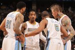 DENVER, CO - FEBRUARY 28:  (L-R) Wilson Chandler #21, Raymond Felton #20 (hidden), J.R. Smith #5, Arron Afflalo #6 and Chris Andersen #11 of the Denver Nuggets huddle up against the Atlanta Hawks during NBA action at the Pepsi Center on February 28, 2011 in Denver, Colorado. The Nuggets deafeated the Hawks 100-90. NOTE TO USER: User expressly acknowledges and agrees that, by downloading and or using this photograph, User is consenting to the terms and conditions of the Getty Images License Agreement.  (Photo by Doug Pensinger/Getty Images)