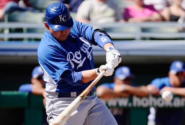 MESA, AZ - MARCH 09: Billy Butler #16 of the Kansas City Royals hits a one-run single against the Chicago Cubs during the spring training baseball game at HoHoKam Stadium on March 9, 2011 in Mesa, Arizona.  (Photo by Kevork Djansezian/Getty Images)