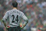 PARIS - MAY 17:  Manuel Almunia of Arsenal looks dejected during the UEFA Champions League Final between Arsenal and Barcelona at the Stade de France on May 17, 2006 in Paris, France.  (Photo by Laurence Grifftihs/Getty Images)