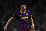 BARCELONA, SPAIN - MARCH 08:  David Villa of FC Barcelona runs with the ball during the UEFA Champions League round of 16 second leg match between Barcelona and Arsenal at the Camp Nou stadium on March 8, 2011 in Barcelona, Spain.  Barcelona won 3-1.  (Photo by David Ramos/Getty Images)