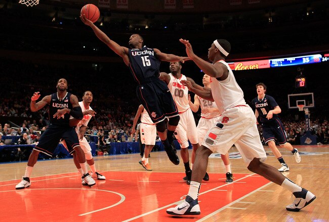NEW YORK, NY - MARCH 11:  Kemba Walker #15 of the Connecticut Huskies drives to the basket against Syracuse Orange during the semifinals of the 2011 Big East Men's Basketball Tournament presented by American Eagle Outfitters at Madison Square Garden on March 11, 2011 in New York City.  (Photo by Chris Trotman/Getty Images)
