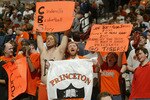 DENVER - MARCH 18:  Fans of the Princeton Tigers cheer during a timeout against the Texas Longhorns during their first round game of the NCAA Division I Men's Basketball Tournament March 18, 2004 at the Pepsi Center in Denver, Colorado.  (Photo by Brian Bahr/Getty Images)