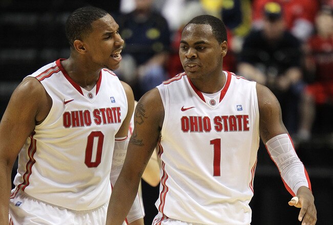 INDIANAPOLIS, IN - MARCH 12:  Jared Sullinger #0 and Deshaun Thomas #1 of the Ohio State Buckeyes react against the Michigan Wolverines during the semifinals of the 2011 Big Ten Men's Basketball Tournament at Conseco Fieldhouse on March 12, 2011 in Indianapolis, Indiana.  (Photo by Andy Lyons/Getty Images)